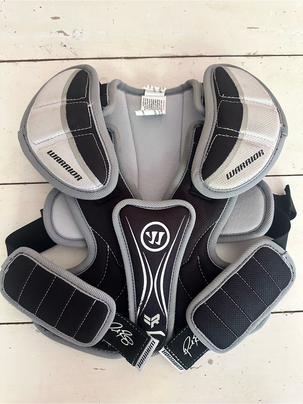 Warrior Lacrosse/Field Shoulder Pads in Black and Gray